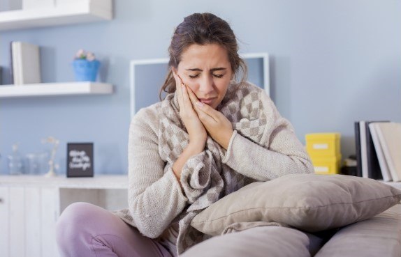 woman in pain in Dover